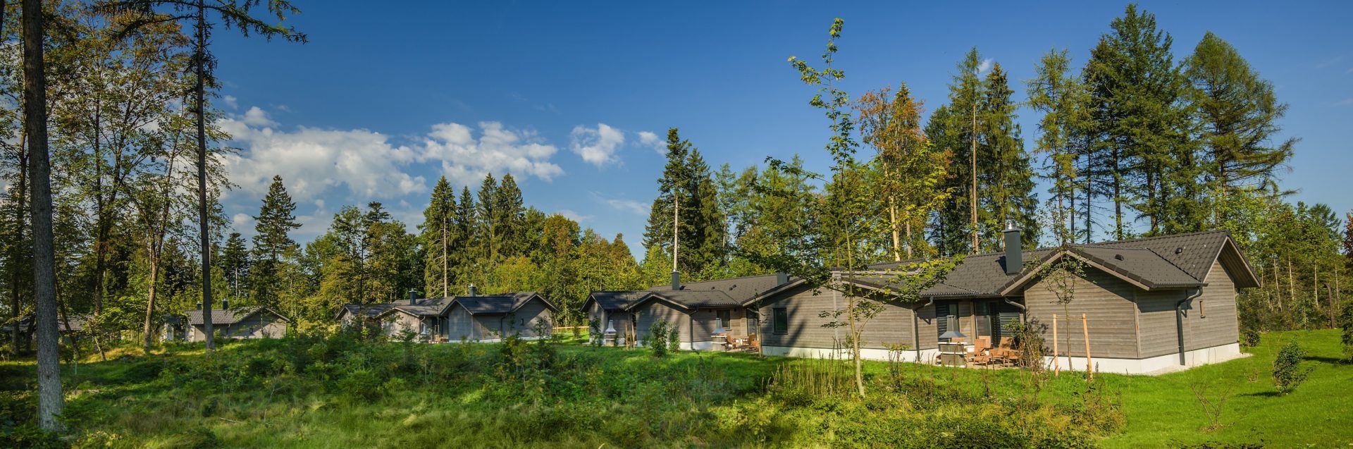 Contracting banner center parc ferienhäuser von außen